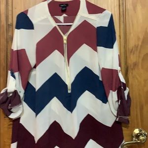 Rue21 blouse chevron with gold zipper.